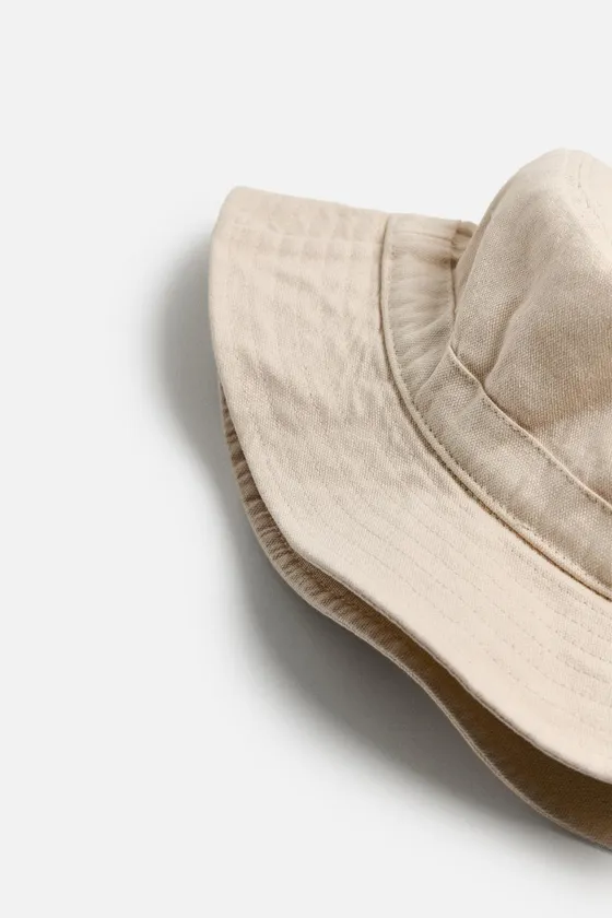 ПАНАМА ИЗ ТКАНИ С ЭФФЕКТОМ ПОТЕРТОСТИ