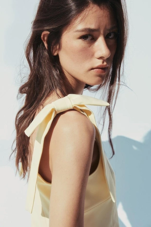 Топ из эластичной такни с бантами- Заказать в России