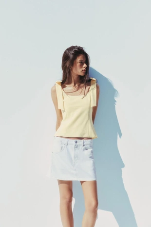 Топ из эластичной такни с бантами- Заказать в России