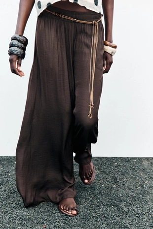 Широкие брюки из струящейся ткани- Заказать в России