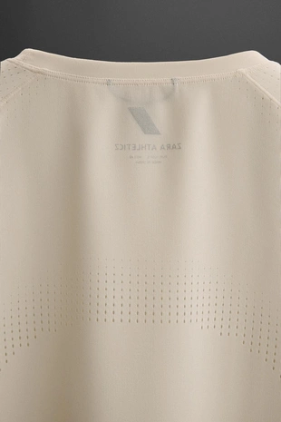 Футболка из рельефной ткани с перфорацией- Заказать в России