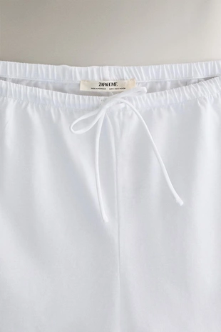 Шорты из хлопка с кружевным узором- Заказать в России