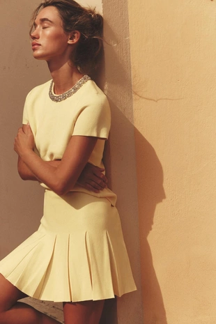 Трикотажная мини-юбка в складку- Заказать в России