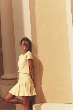 Трикотажная мини-юбка в складку- Заказать в России