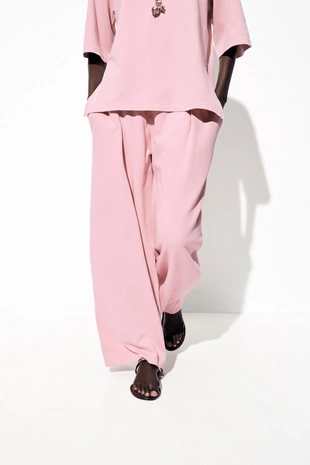 Брюки из ткани с эффектом потертости- Заказать в России