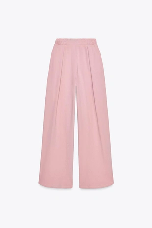 Брюки из ткани с эффектом потертости- Заказать в России