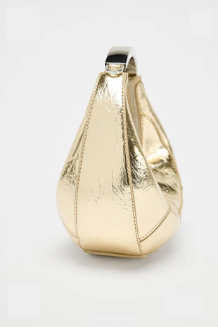 Овальная сумка с металлической ручкой