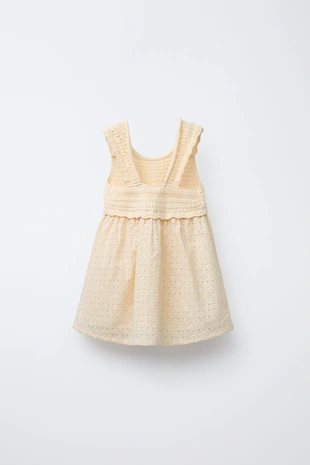 Комбинированное трикотажное платье с вышивкой в швейцарском стиле- Заказать в России