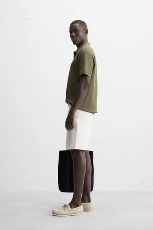 Поло с вертикальным рельефным узором- Заказать в России