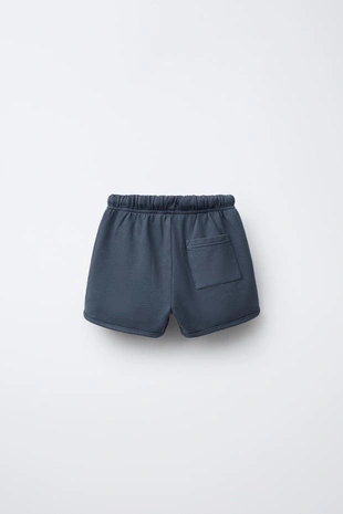 STRAIGHT FIT GARMENT-DYED PLUSH BERMUDA SHORTS WITH LABEL