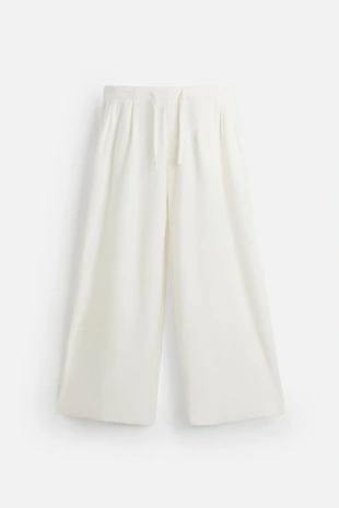 Брюки свободного кроя с текстурой- Заказать в России