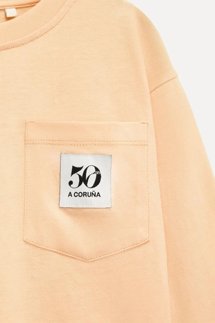 6–14 лет / футболка с карманом и нашивкой 50TH ANNIVERSARY- Заказать в России