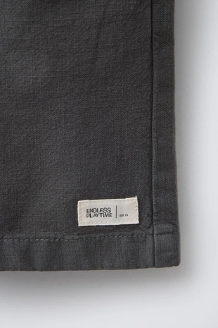 Хлопковые шорты-бермуды широкого кроя с этикеткой