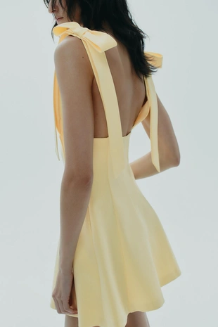 Короткое комбинированное платье с бантами- Заказать в России