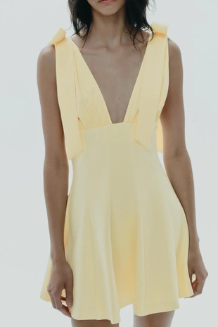 Короткое комбинированное платье с бантами- Заказать в России