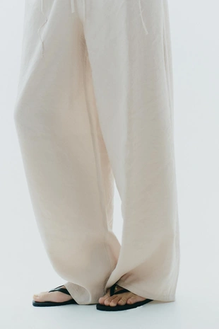 Брюки-палаццо из струящейся ткани- Заказать в России