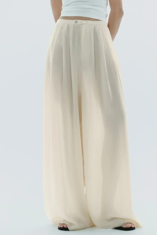 Длинные брюки со множественными складками- Заказать в России