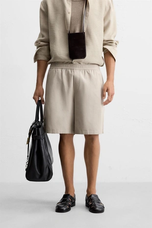 Шорты-бермуды классического кроя из тканевой структуры- Заказать в России