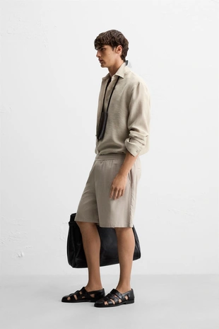 Шорты-бермуды классического кроя из тканевой структуры- Заказать в России