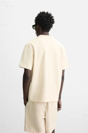 Поло с рельефной тканью- Заказать в России