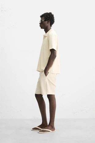 Поло с рельефной тканью- Заказать в России