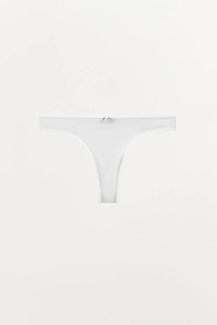 Трусы танга POINTELLE с цветком- Заказать в России