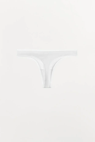 Трусы танга POINTELLE с цветком- Заказать в России