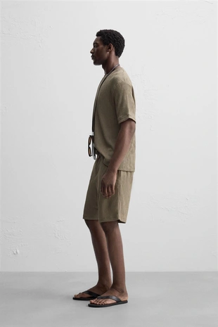 Футболка из ткани неоднородной структуры- Заказать в России