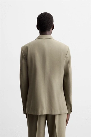 Костюмный блейзер структурной ткани- Заказать в России