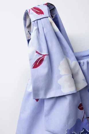 Асимметричный топ с цветочным принтом- Заказать в России