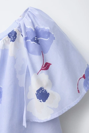 Асимметричный топ с цветочным принтом- Заказать в России