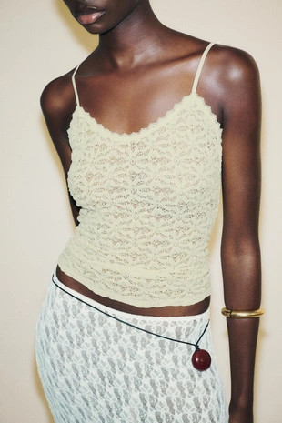 Длинная расклешенная кружевная юбка