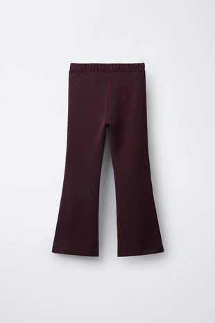 Расклешенные брюки из модала с контрастной отделкой- Заказать в России