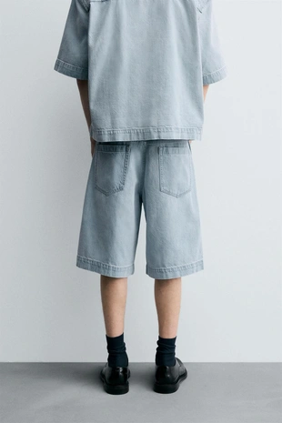 Джинсовые бермуды с защипами и свободным кроем- Заказать в России