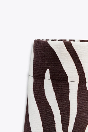 Брюки с анималистическим принтом- Заказать в России