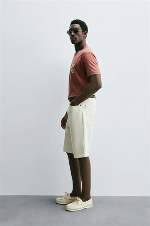 Футболка с вышивкой и эффектом потертости- Заказать в России