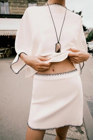 Трикотажная юбка с контрастной вышивкой- Заказать в России