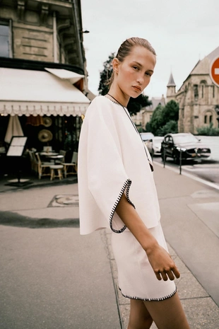 Трикотажная юбка с контрастной вышивкой- Заказать в России