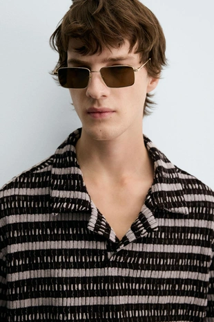 Жаккардовое поло с ажурным узором- Заказать в России