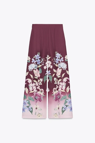 Брюки широкого кроя с цветочным принтом- Заказать в России