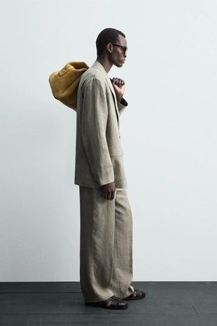 Костюмные брюки из 100% льна с эффектом стирки- Заказать в России