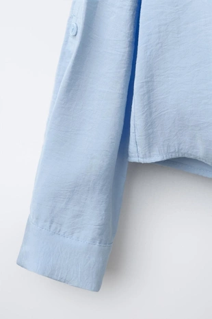 Рубашка струящегося кроя с узлом