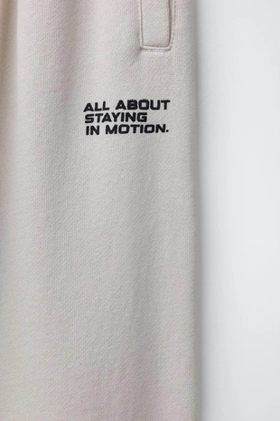 Брюки-джоггеры с принтом граффити- Заказать в России