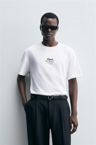 Футболка с контрастными принтами- Заказать в России