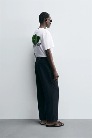 Футболка с контрастными принтами- Заказать в России