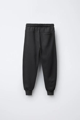 Брюки-джоггеры из мягкой ткани- Заказать в России