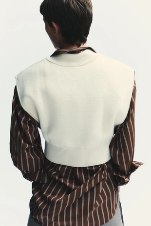 Короткий однотонный трикотажный жилет- Заказать в России