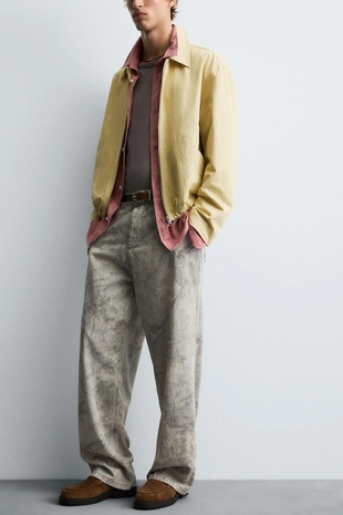 Брюки RELAXED FIT с абстрактным принтом- Заказать в России