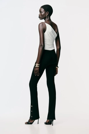 Легинсы FLARE с пуговицами снизу- Заказать в России