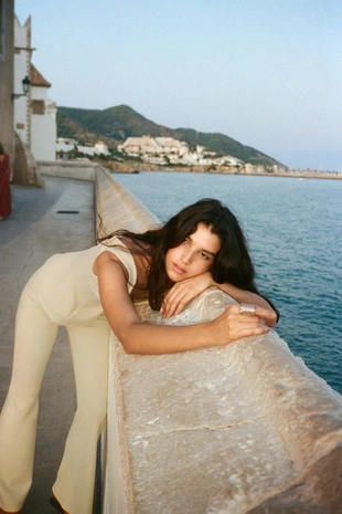 Брюки из крепа с расклешенным подолом- Заказать в России